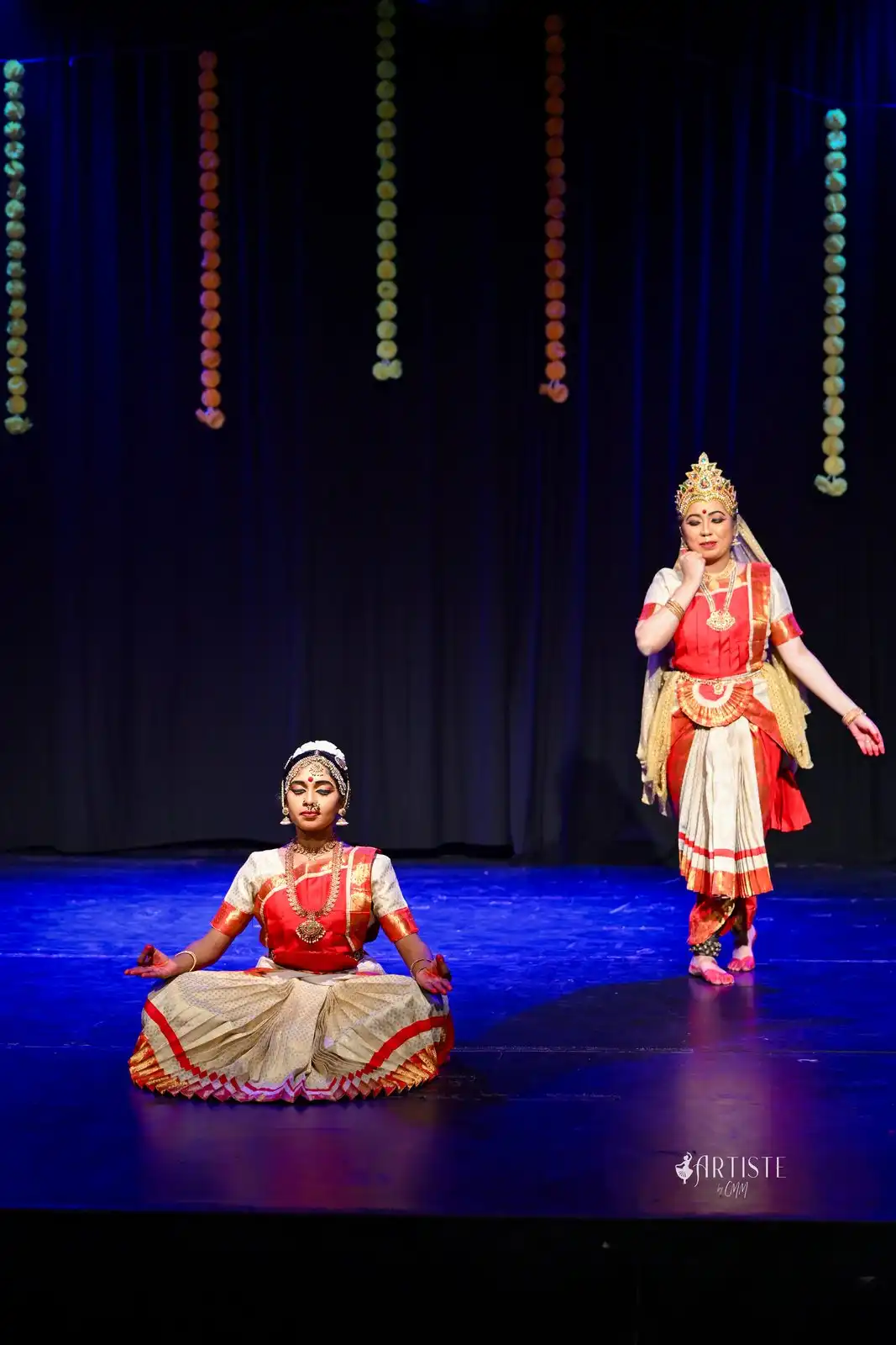 Irumudi Iraiva — seated and standing dancers on stage